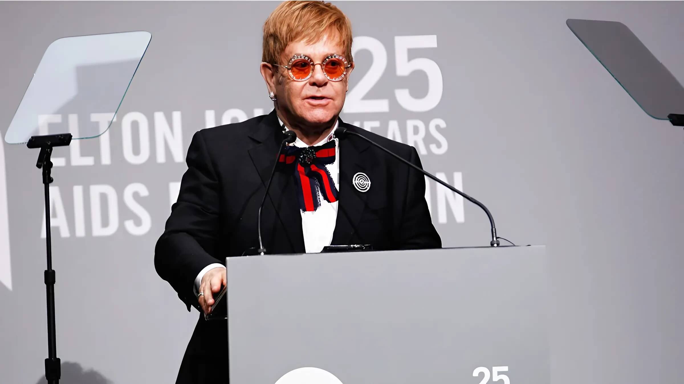 Elton John at AIDS Foundation event, a leader in celebrity philanthropy