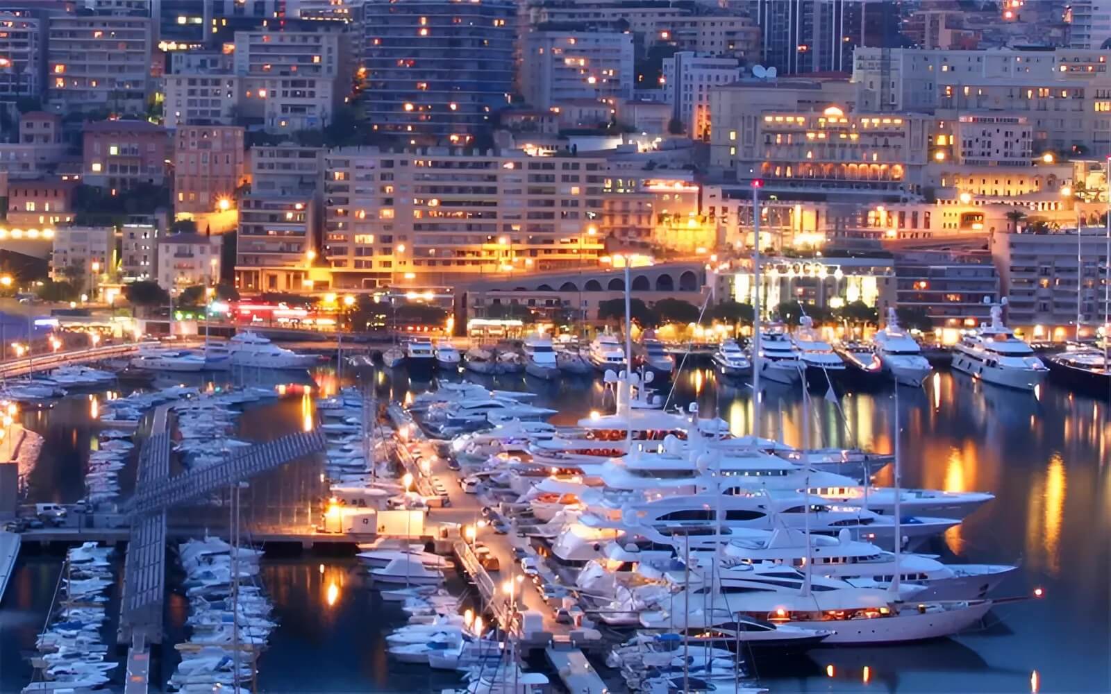 Luxury travel in Monaco with exclusive yacht-filled harbors